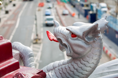 LONDON, UK - SEPTEMBER 19, 2015: Holborn Viaduct dragon and motorway blur at backgroundのeditorial素材