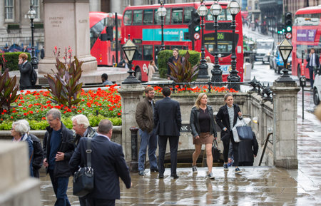 LONDON, UK - SEPTEMBER 17, 2015: Bank of England square after the rain and walking peopleのeditorial素材