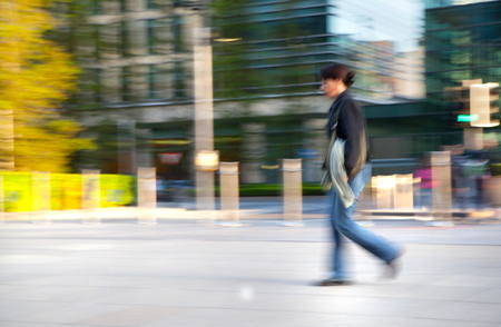 LONDON, UK - MAY 21, 2015:  Blur of Business people walking on street after working day. Canary Wharfのeditorial素材