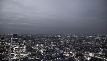 LONDON, UK - APRIL 15, 2015: London night view. Aerial view at railway junctionのeditorial素材