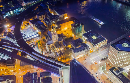 LONDON, UK - APRIL 15, 2015: London night view. Aerial view at Tower bridge and river Thamesのeditorial素材