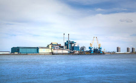 LONDON, UK - APRIL 4, 2015: Factory on the River Thames bankのeditorial素材