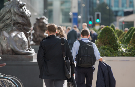 LONDON, UK - SEPTEMBER 14, 2015:  Office workers going to work. Early morning hours in Canary Wharf business lifeのeditorial素材