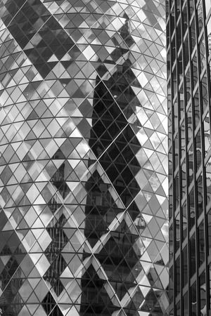 LONDON UK - SEPTEMBER 19, 2015 - Modern English architecture, Glass building texture and reflections. City of Londonのeditorial素材