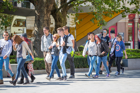 LONDON, UK - SEPTEMBER 10, 2015: Office workers and people walking in the st. Paul's cathedral park in lunch time. City of London business lifeのeditorial素材