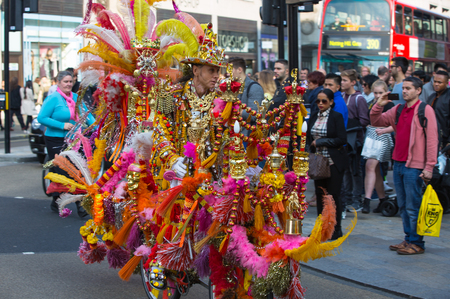 LONDON, UK - OCTOBER 4, 2016: Decorated bike rider performing his outfit at Regent streetのeditorial素材