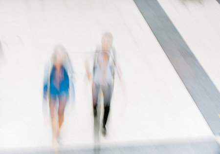 LONDON, UK - SEPTEMBER 12, 2015: Liverpool street train station with walking people blur people,