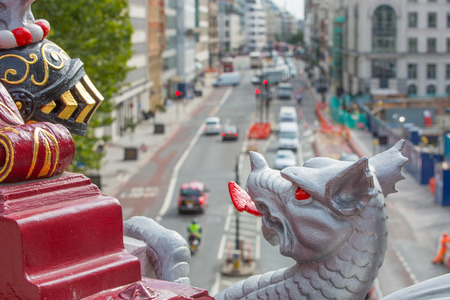 LONDON, UK - SEPTEMBER 19, 2015: Holborn street with traffic and people crossing the roadのeditorial素材