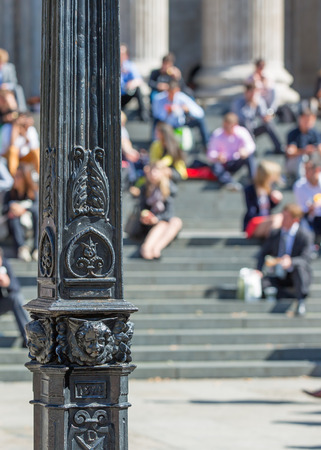 LONDON, UK - SEPTEMBER 10, 2015: People and tourists sitting on the stairs of st. Paul's cathedralのeditorial素材