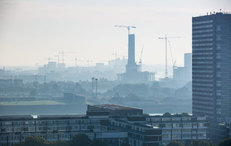London early morning view with building constructing sites and cranes