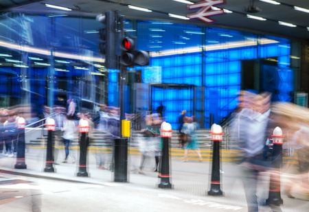 LONDON, UK - MAY 17, 2016: Business people walk through the City of London street. Blurred image. City of London business life conceptのeditorial素材