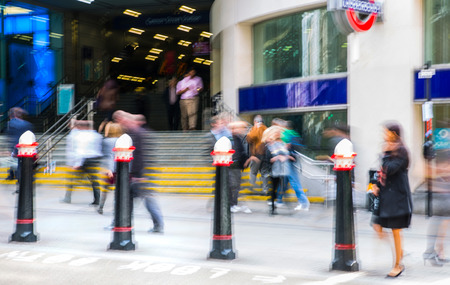 LONDON, UK - MAY 17, 2016: Business people walk through the City of London street. Blurred image. City of London business life conceptのeditorial素材