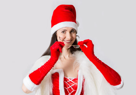 Attractive Santa girl smiling portraitの写真素材