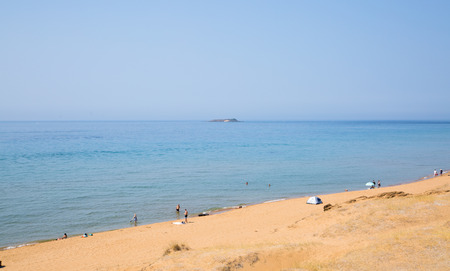 CORFU, GREECE - JULY 28, 2016:   Sandy beach of Corfu, Greece.の写真素材