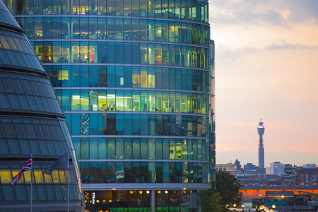 LONDON, UK - SEPTEMBER 19, 2015: City of London office buildings with first night lights at sunset.のeditorial素材