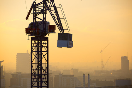 London, UK  - January 20, 2016:  London view at sunset  with cranes. UKのeditorial素材