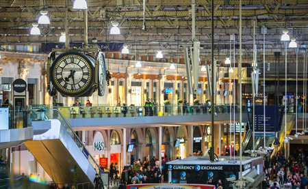 LONDON UK - 19 DECEMBER, 2015: Waterloo international train station in the centre of London, one of the main rail junction of Great Britain Departure hall with lots of peopleのeditorial素材