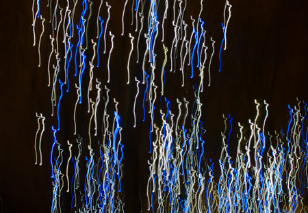 Abstract background made of Christmas lights with long exposure.