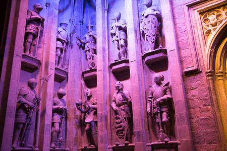 Leavesden, London, UK - 1 March 2016: Interior of the Great Hall (Dining Hall) of Hogwarts. Fire place and table. Warner Brothers Studio display of decorations for Harry Potter filmのeditorial素材