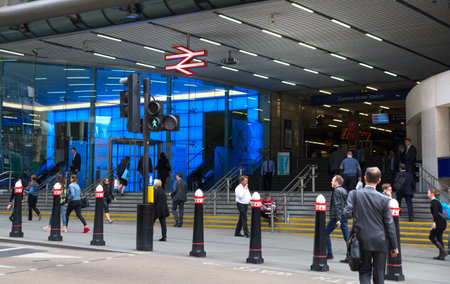LONDON, UK - 17 may, 2016: City of London. Cannon street tube station entrance and walking people
