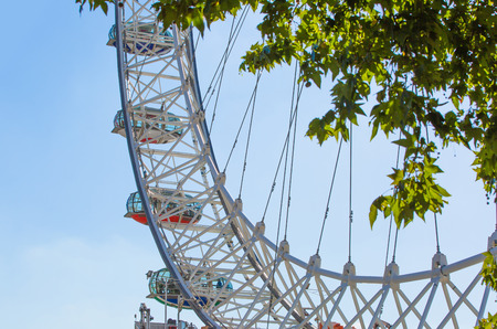 LONDON, UK - SEPTEMBER 10, 2015: London eye and lantern. Giant Ferris wheel opened on 31 December 1999, the most famous attraction in centre Londonのeditorial素材