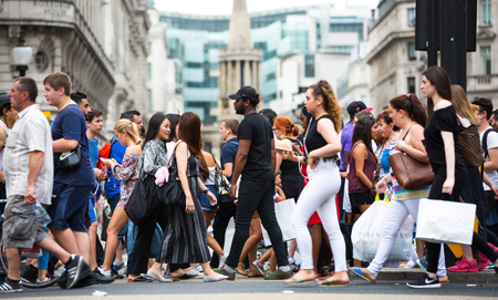 London, UK - August 24, 2016:  Lots of people crossing the Regent street at the traffic lights. Populated city conceptのeditorial素材