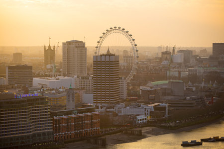 London, UK - December 19, 2016: London at sunset, view from the St. Paul's cathedral. Panoramic view includes London eye, river Thames and embankmentのeditorial素材