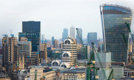 London, UK - December 19, 2016: City of London business and banking aria at sunset. View includes...