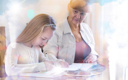 10 years old girl and her teacher. Little girl study during her private lesson. Tutorial and...