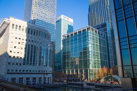 London, UK - November 30, 2016: Canary Wharf business and banking aria at sunny day. Main square view with glass skyscrapersのeditorial素材