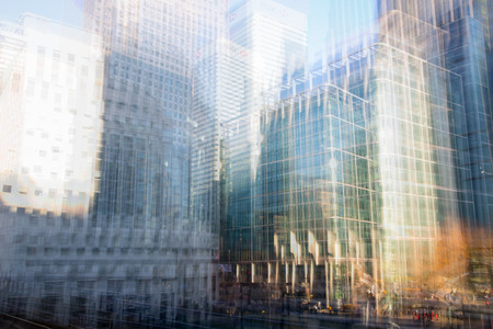 Multiple exposure effect image. Canary Wharf office buildings view. Londonの写真素材
