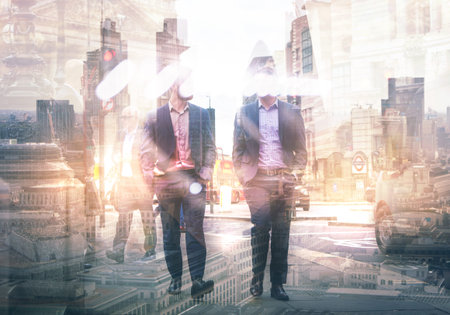 Two businessman in the City. Business and modern life concept. Multiple  exposure image