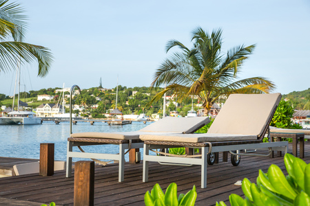 Antigua, Caribbean islands, English Harbour - May 19, 2017: South Point Hotel at sunset, view with pool and palmsのeditorial素材