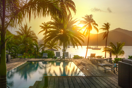 Antigua, Caribbean islands, English Harbour - May 20, 2017:  Galleon beach hotel view swimming pool at sunsetのeditorial素材