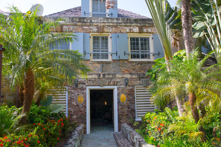 Antigua, Caribbean islands, English Harbour - May 20, 2017: Nelson's Dockyard is a cultural heritage site and marina. Admiral's Inn and storage houses 18th centuryのeditorial素材