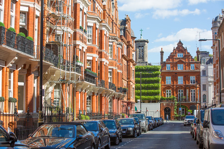 London, UK - September 8, 2016: Residential aria of Mayfair with row of periodic buildings. Luxury property in the centre of London.のeditorial素材