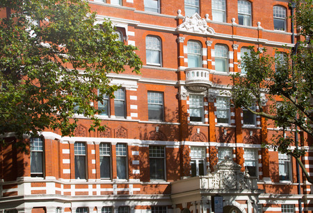 London, UK - September 8, 2016: Residential aria of Kensington with row of periodic buildings. Luxury property in the centre of London.  Kensington church street.のeditorial素材