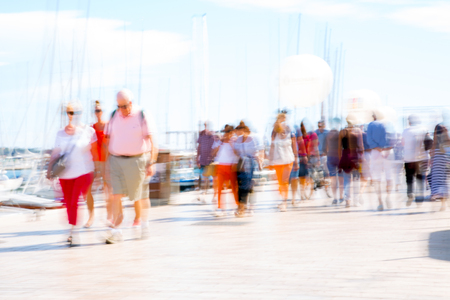 Cannes, ITALY - September 18, 2016: Le Vieux Port of Cannes. Blur of people walking on the Yachting festival in front of the main harbourのeditorial素材