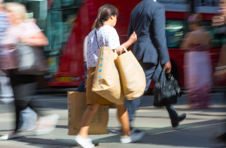 LONDON, UK - June 9, 2017: Blurred image of walking people at Oxford street, the main destination for shopping at Westend.のeditorial素材