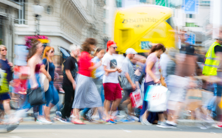 London, UK - August 24, 2017: Piccadilly circus with lots of people, tourists and Londoners crossing the junction. Blurred type imageのeditorial素材