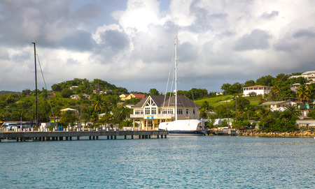 Antigua, Caribbean islands, English Harbour - May 19, 2017: Sailing boats on the pear.のeditorial素材