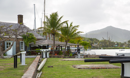 Antigua, Caribbean islands, English Harbour - May 19, 2017: English harbour international preserve area. view with sailing boats and historical buildings Nelson's timeのeditorial素材
