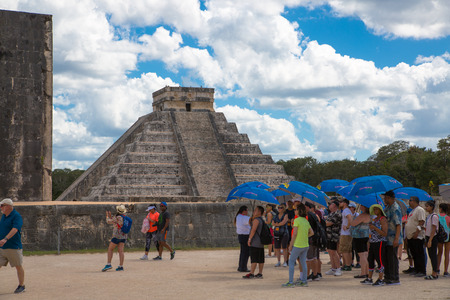 Mexico, Yucatan, Chichen Itza - February 17, 2018: El Castillo, Mayan Pyramid and lots of tourists visiting siteのeditorial素材