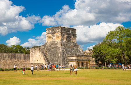 Mexico, Yucatan, Chichen Itza - February 17, 2018: Mayan Great Ball court and Temple of Jaguar
