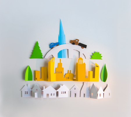 Abstract city made of paper cut. Skyscrapers and residential buildings. Street view. Paper design with space for text.の写真素材