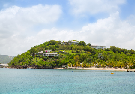 Antigua, Caribbean islands - May 20, 2017: English Harbour view with Galeon beach, sun beds and umbrellasのeditorial素材