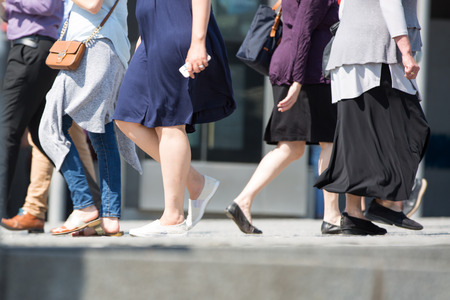 London, UK - 20 April, 2018: Feet of people walking in the City of London. Busy modern life concept.のeditorial素材
