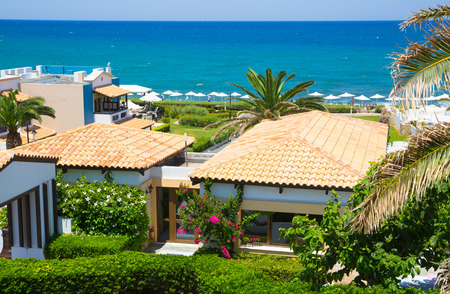 Hersonissos, Crete, Greece- July 17, 2018: The 5 stars Aldemar Knossos Royal Hotel with village-style layout of Royal villas, surrounded by beautiful garden and marble decorated pathsのeditorial素材