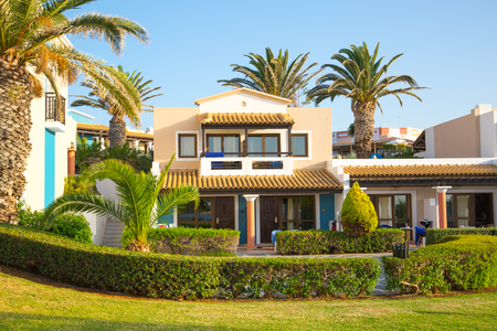 Hersonissos, Crete, Greece- July 17, 2018: The 5 stars Aldemar Knossos Royal Hotel with village-style layout of Royal villas, surrounded by beautiful garden and marble decorated pathsのeditorial素材
