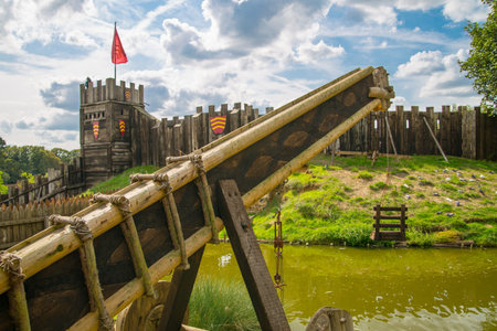 Essex, UK - 31 August, 2018: Ducking stool, torture tool in the Norman village reconstruction, educational centre for kids with historical activities and every day medieval life experienceのeditorial素材